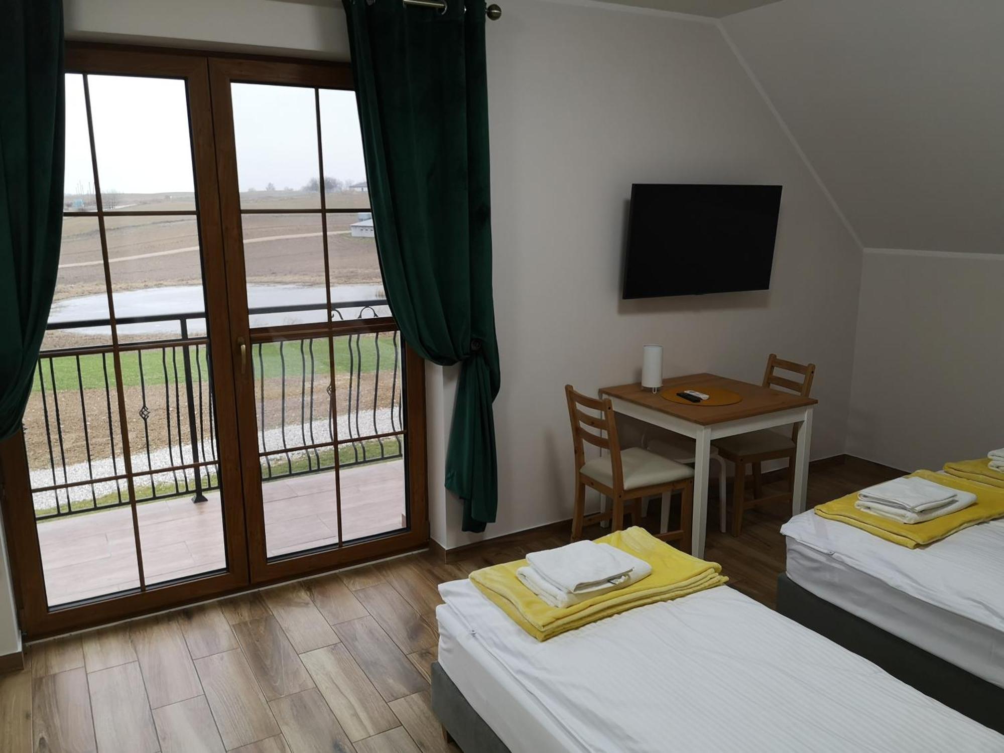 Apartamenty, Zielone Wzgorze Wiktora W Mikolajkach Миколайки Номер фото